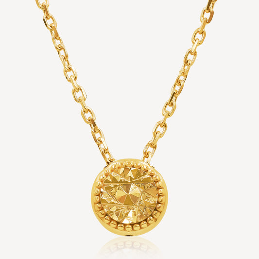 A 916 gold necklace with a gold chain and a central celestial gemstone pendant.