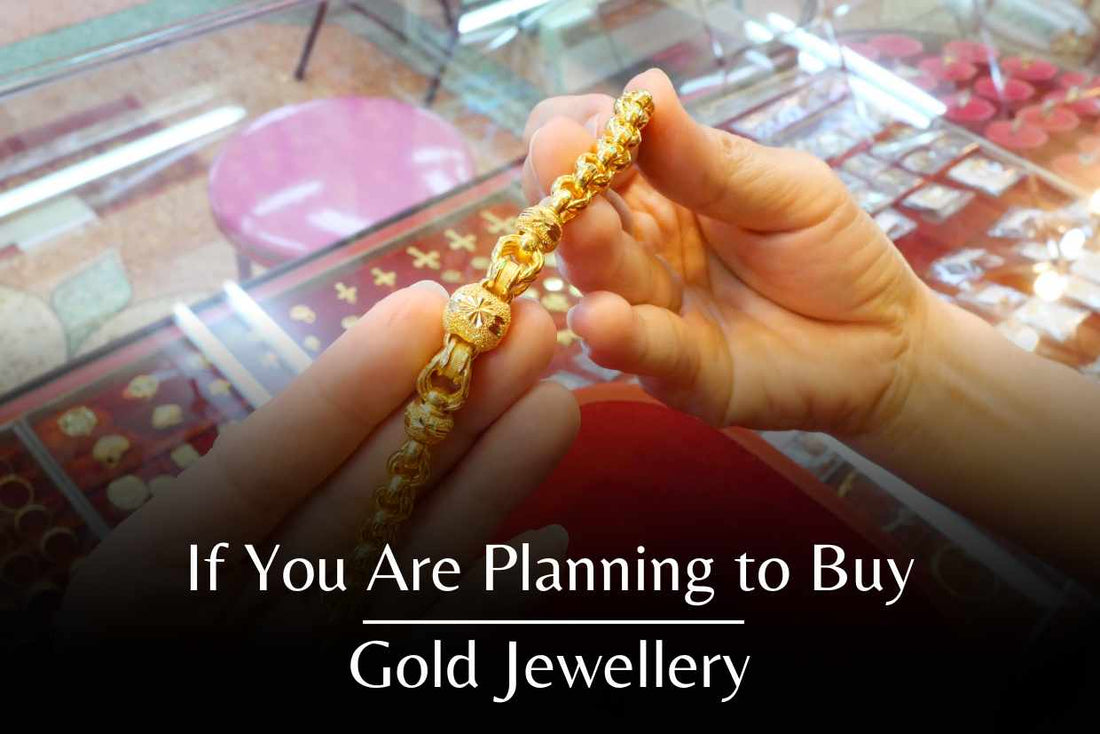 Checking quality of the gold jewellery. 