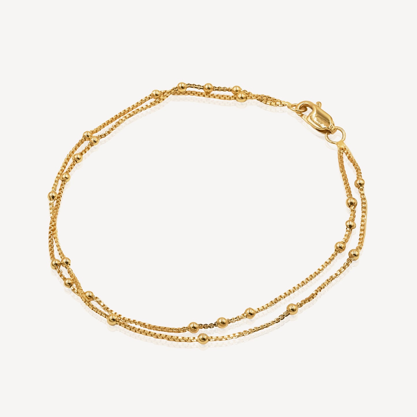 916 Gold Harmonic Sphere Bracelet