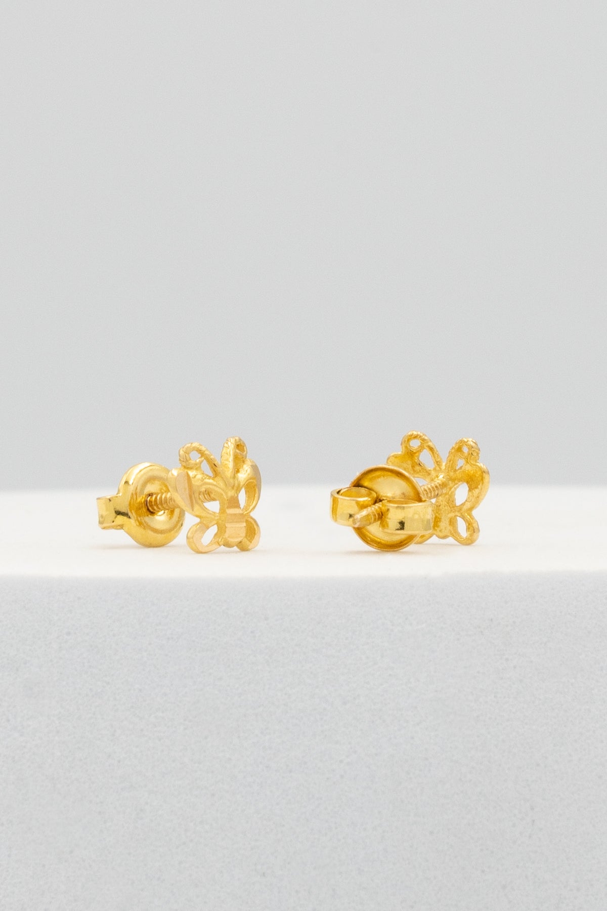 916 Gold Dainty butterfly ear studs for ladies
